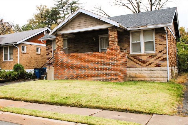 view of front of home with a front yard