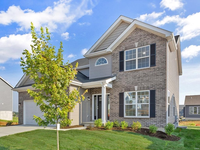 view of front of property featuring a front yard and a garage