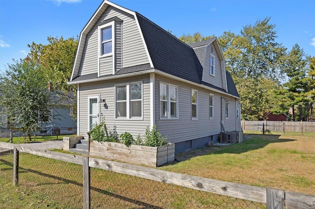 view of home's exterior featuring a yard