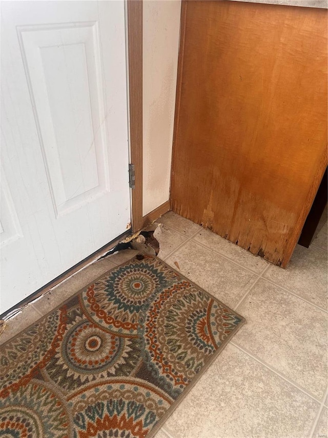 interior details featuring tile patterned flooring