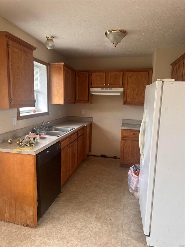 kitchen with white fridge with ice dispenser, a textured ceiling, black dishwasher, and sink