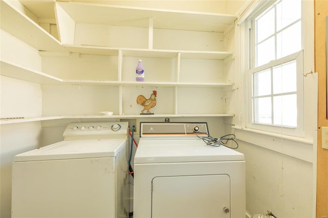 washroom featuring independent washer and dryer