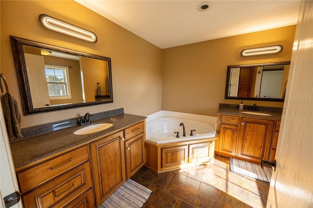 bathroom with vanity and a tub to relax in