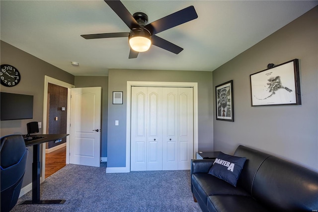 office with ceiling fan and carpet