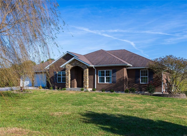 ranch-style home with a front yard