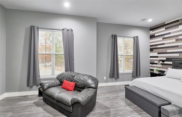 bedroom with wood-type flooring