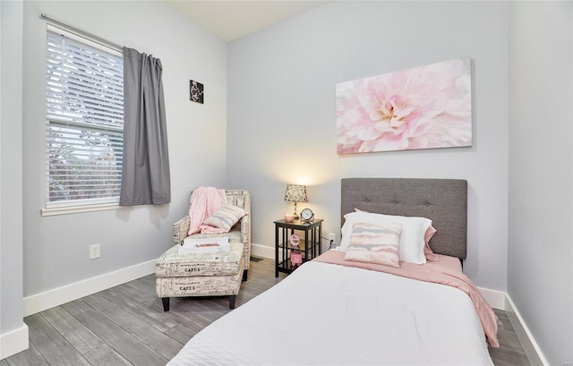 bedroom featuring wood-type flooring