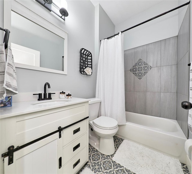 full bathroom featuring toilet, shower / bath combo, vanity, and tile patterned flooring