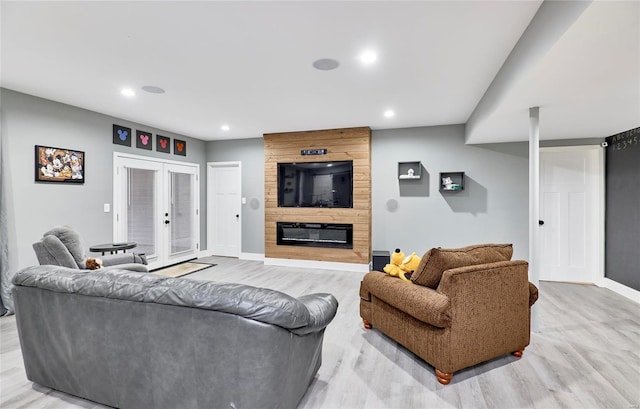 living room with french doors and wood-type flooring