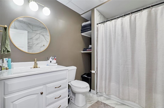 bathroom featuring toilet, vanity, and a shower with shower curtain