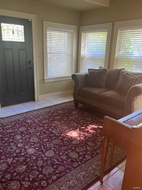 living room featuring light tile patterned floors