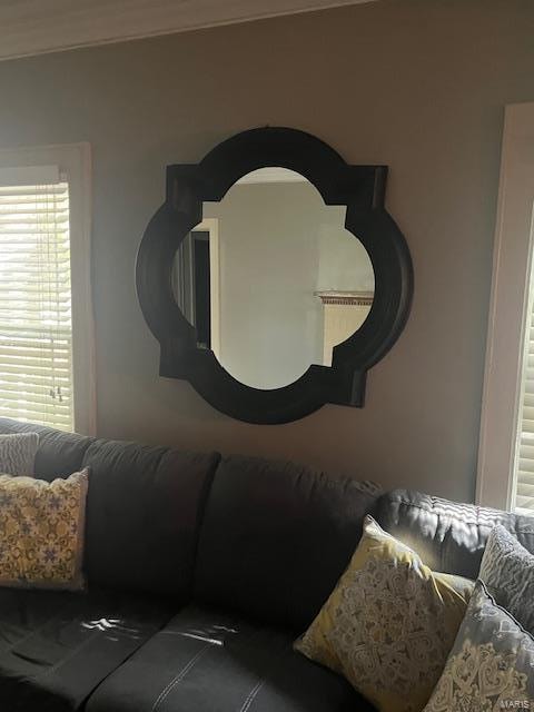 living room with ornamental molding