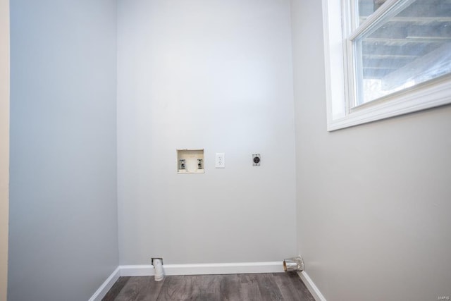 laundry area with hookup for an electric dryer, washer hookup, and dark hardwood / wood-style flooring