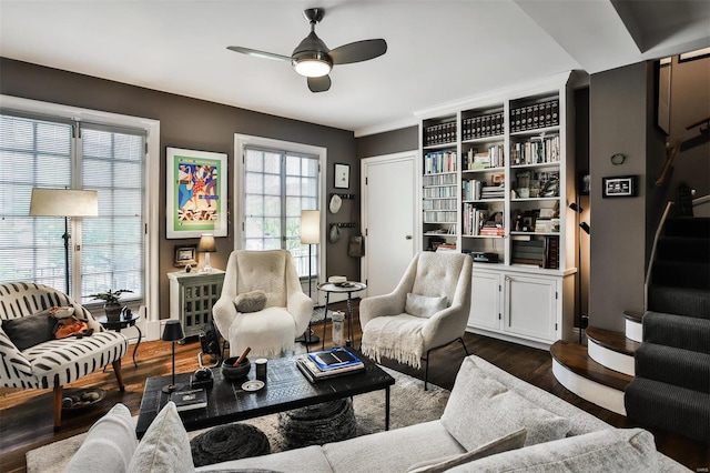 living room with ceiling fan, a healthy amount of sunlight, and dark hardwood / wood-style flooring