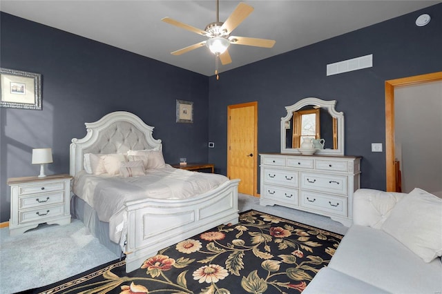 carpeted bedroom with ceiling fan