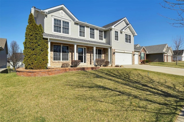 traditional-style home with a front lawn, covered porch, concrete driveway, an attached garage, and brick siding