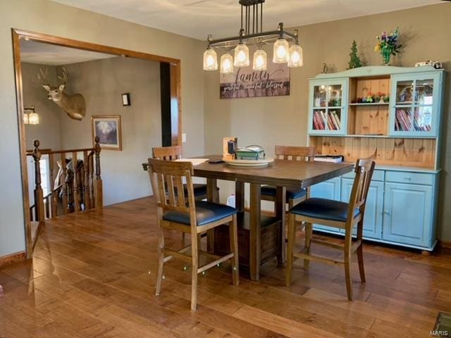 dining area featuring wood-type flooring