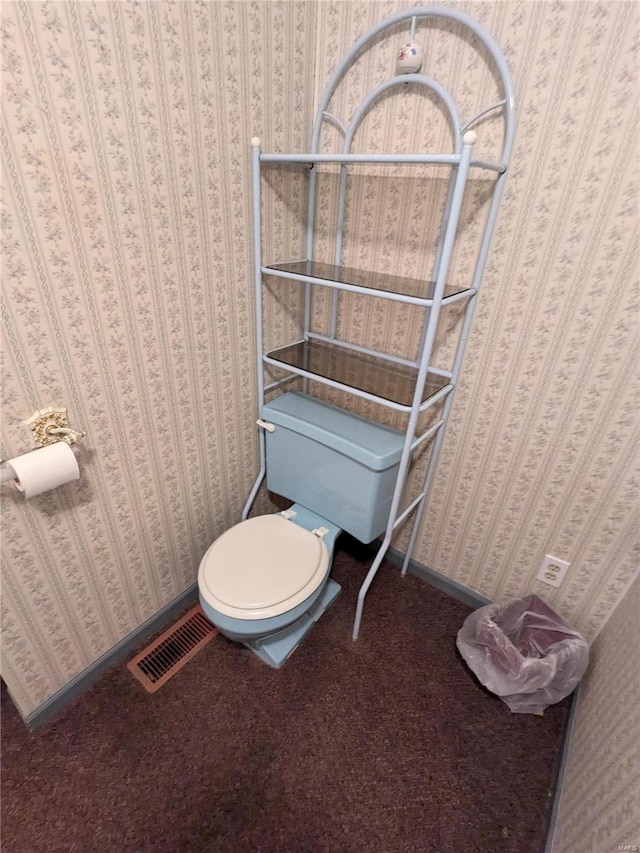 bathroom featuring toilet