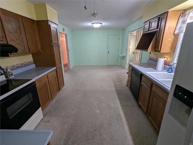 kitchen with hanging light fixtures, white appliances, ventilation hood, and light carpet