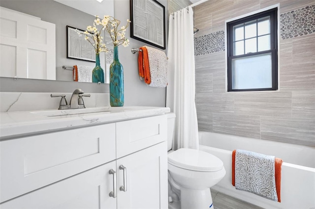 full bathroom with vanity, toilet, and shower / bathtub combination with curtain