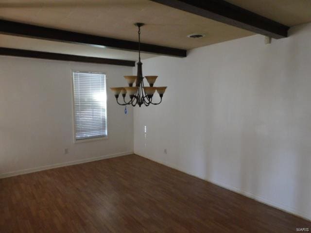 unfurnished dining area featuring beamed ceiling, dark hardwood / wood-style flooring, and an inviting chandelier