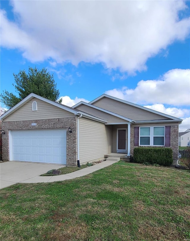 ranch-style home with a front yard and a garage