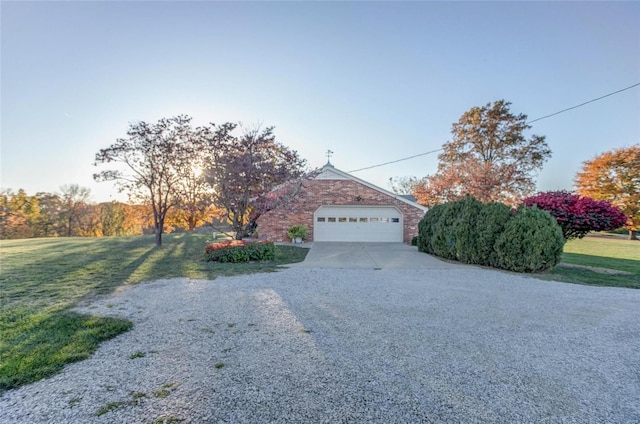 view of front of property with a garage and a front yard