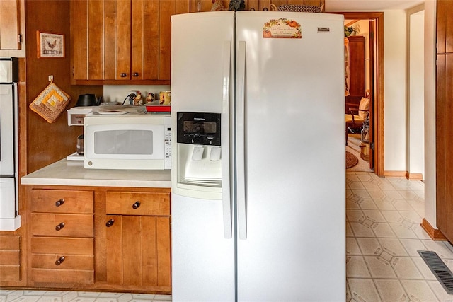 kitchen with white appliances