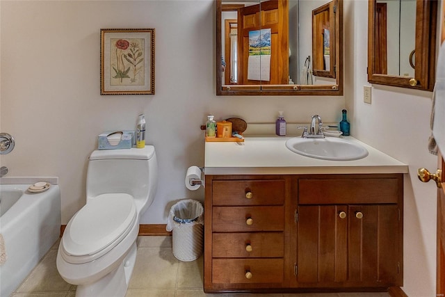 bathroom with tile patterned flooring, vanity, toilet, and a bathing tub