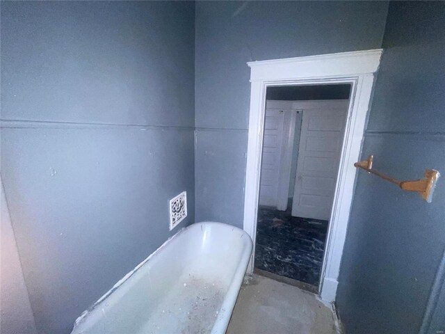 bathroom featuring a bath