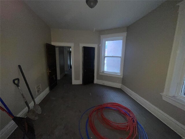 interior space with dark wood-type flooring