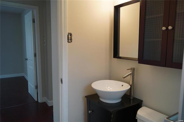 bathroom with vanity and toilet