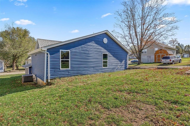 view of property exterior featuring a yard