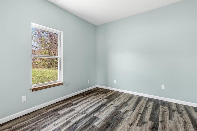 empty room featuring hardwood / wood-style floors and a healthy amount of sunlight