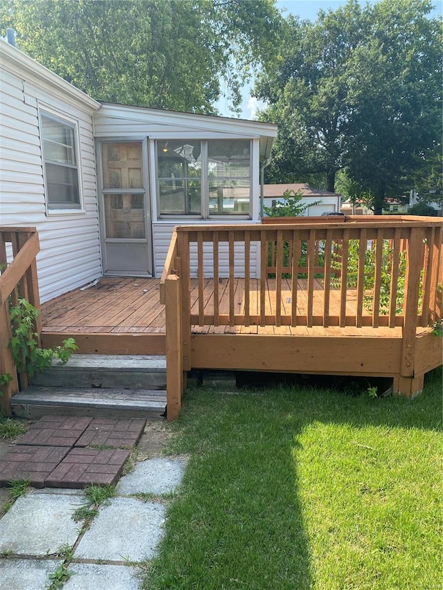 wooden deck with a yard