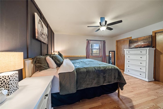 bedroom featuring light wood-type flooring and ceiling fan