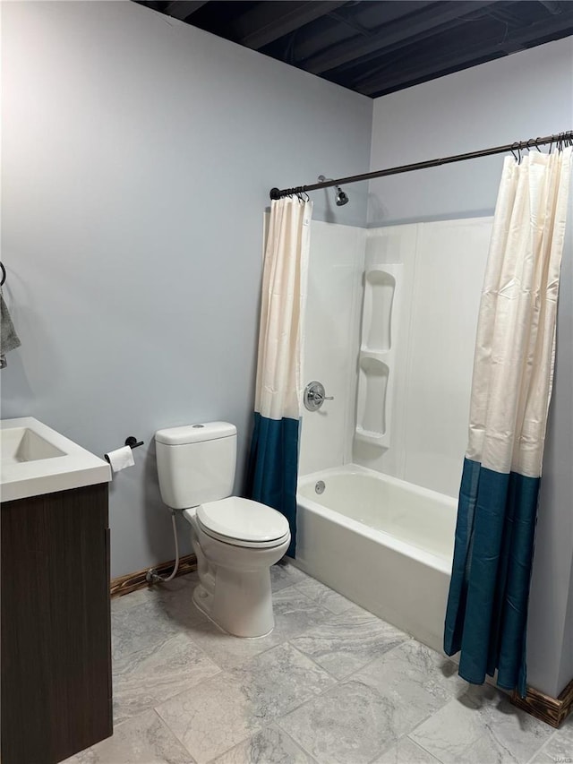 full bathroom with vanity, toilet, and shower / bath combo with shower curtain