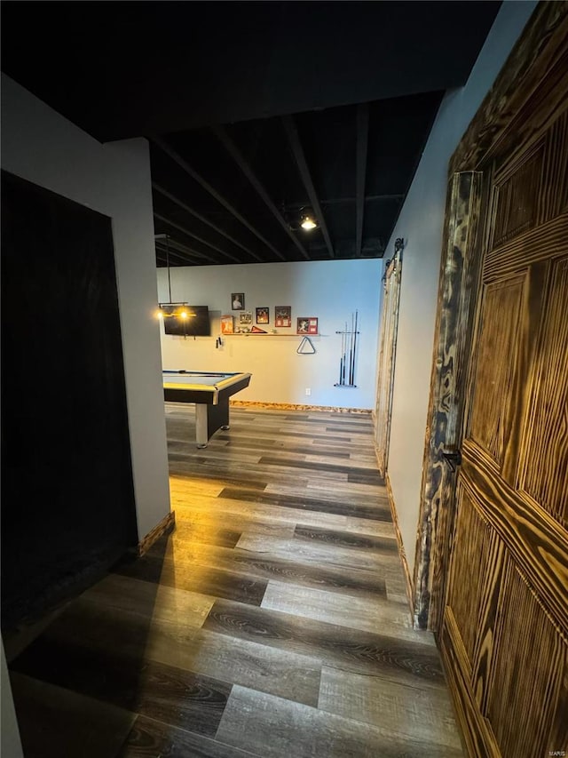 hall with hardwood / wood-style floors