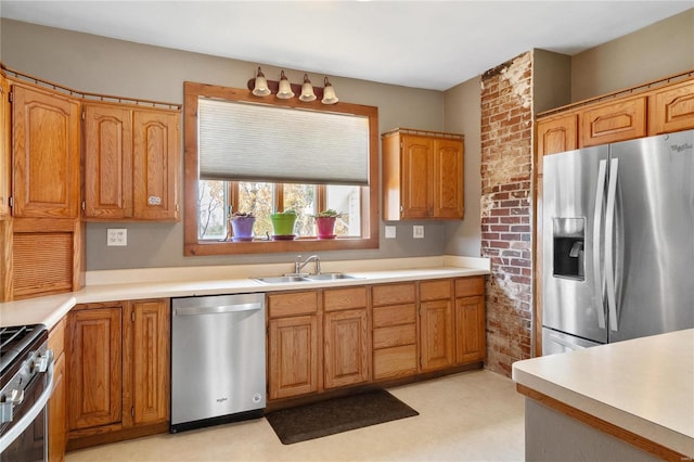 kitchen featuring stainless steel appliances and sink