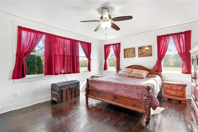 bedroom featuring dark wood-type flooring and ceiling fan