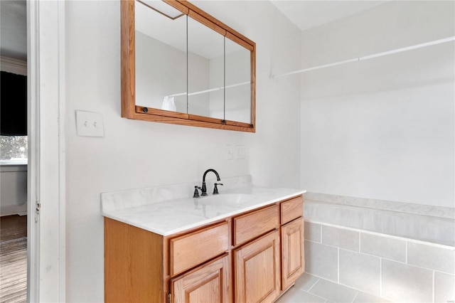 bathroom with vanity and tile patterned floors