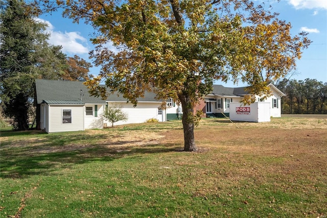 exterior space with a front yard