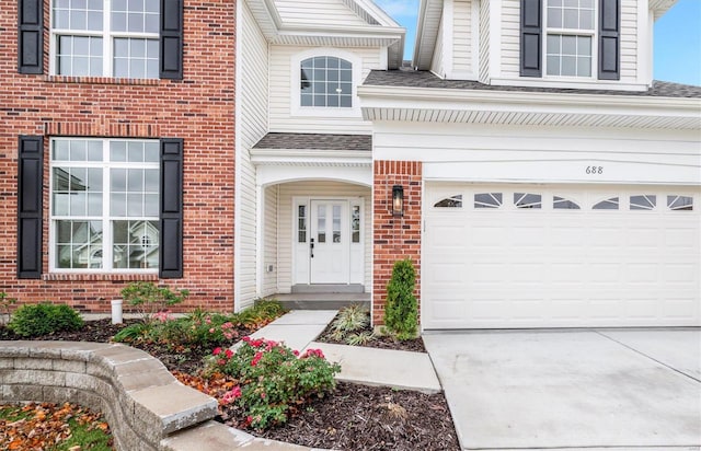 property entrance with a garage