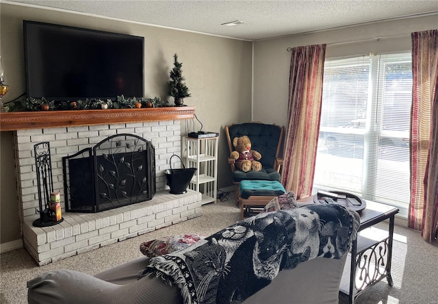 carpeted living room with a textured ceiling and a fireplace