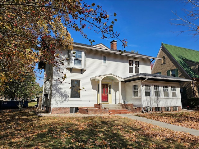 view of front of home with a front yard