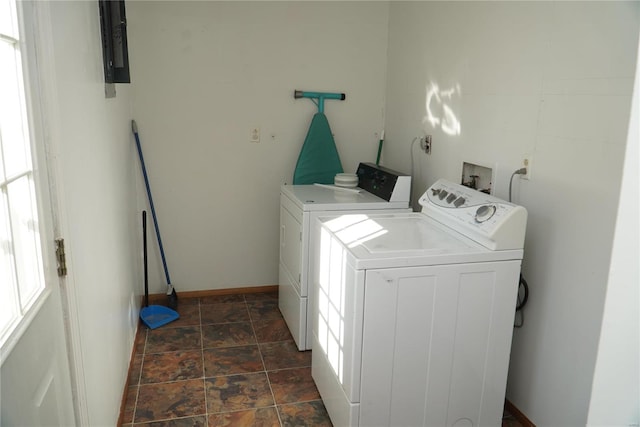 laundry room with separate washer and dryer