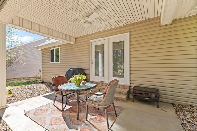 view of patio featuring ceiling fan