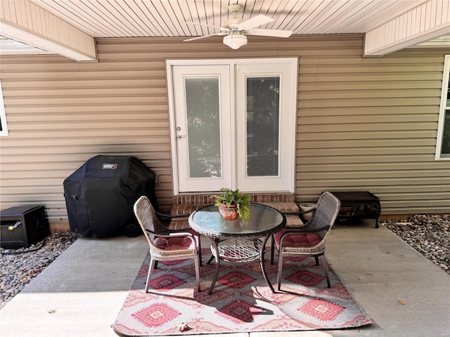 view of patio featuring area for grilling and ceiling fan