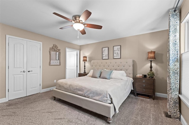 bedroom featuring a closet, ceiling fan, and carpet flooring