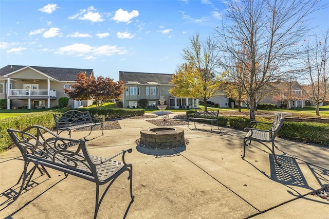 exterior space featuring a fire pit and a patio